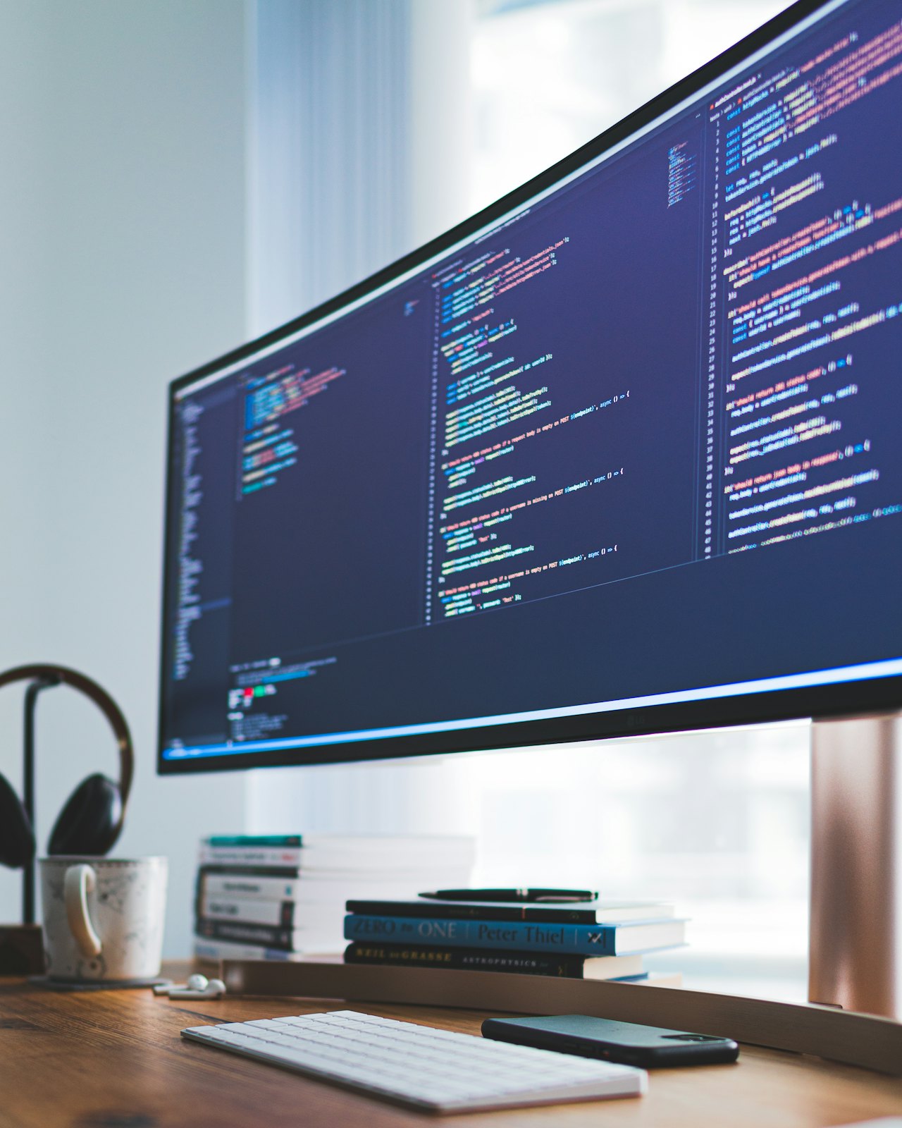 curved monitor with code on it